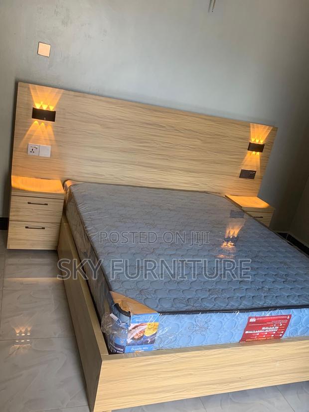 Laminated King Size Bed With Side Drawers Light · Photo 1