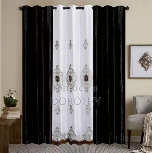 Heavy Sunblock Curtains With a Design Voile