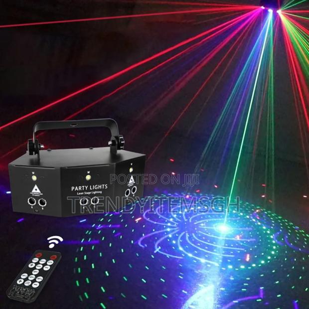 9 Eye Laser Projector Light Strobe Disco Party Light · Photo 2