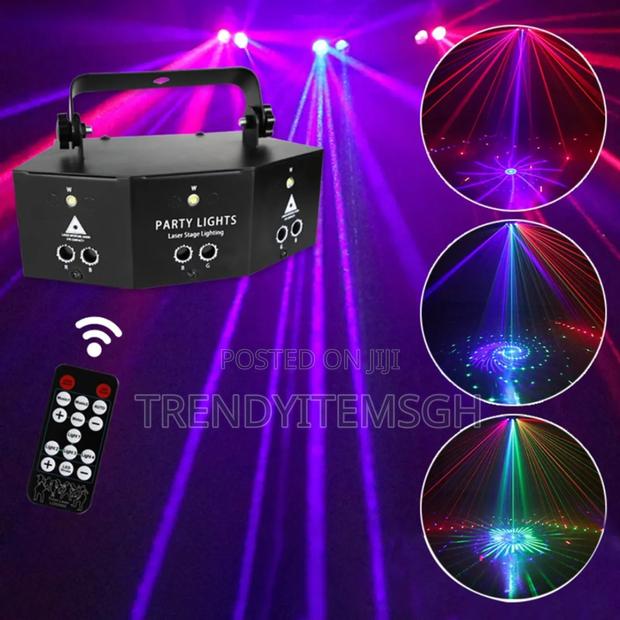 9 Eye Laser Projector Light Strobe Disco Party Light · Photo 3