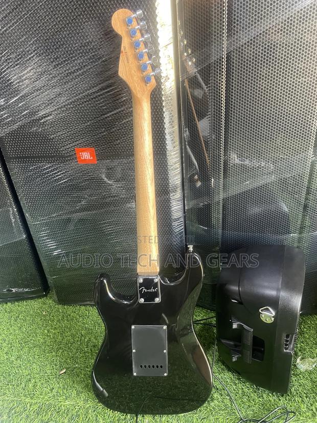 Fender Lead Guitar {Brown} · Photo 2