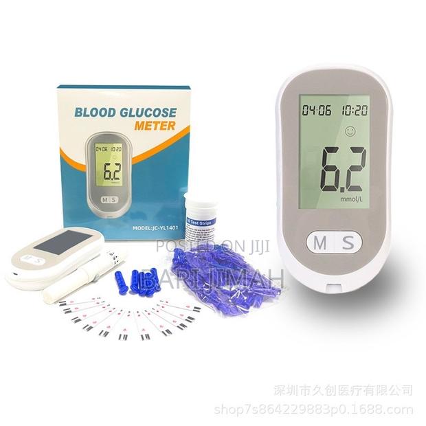 Auto Coding Glucometer Machine + 50 Test Strips and 50 Lancets · Photo 2