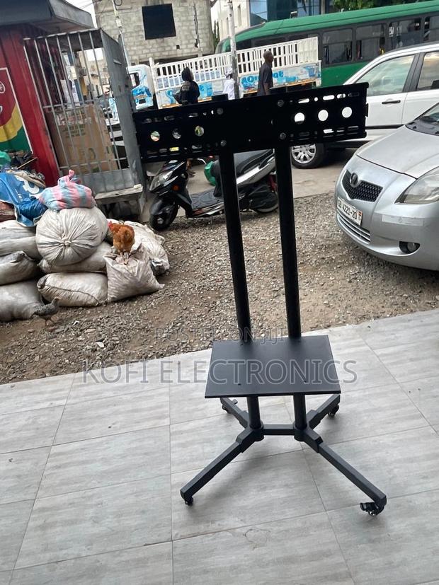 Durable 32–65” Screen Stand Strong, Balanced Industrial-Style · Photo 1