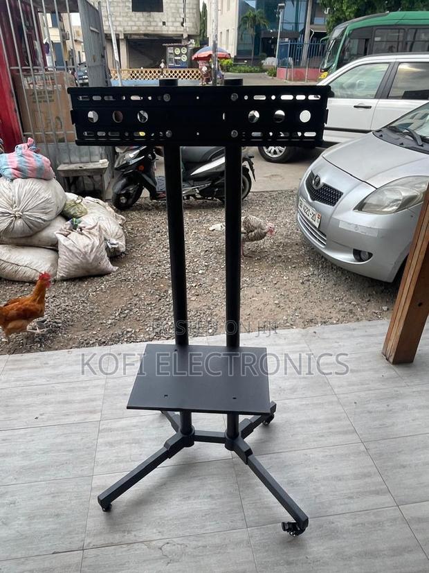 Robust 32–65 Inch Floor Tv Stand Solid, Secure Reliable · Photo 1