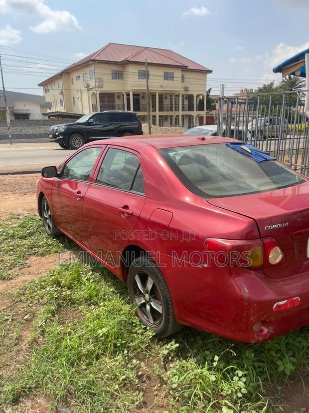 Toyota Corolla 2009 Red · Photo 3