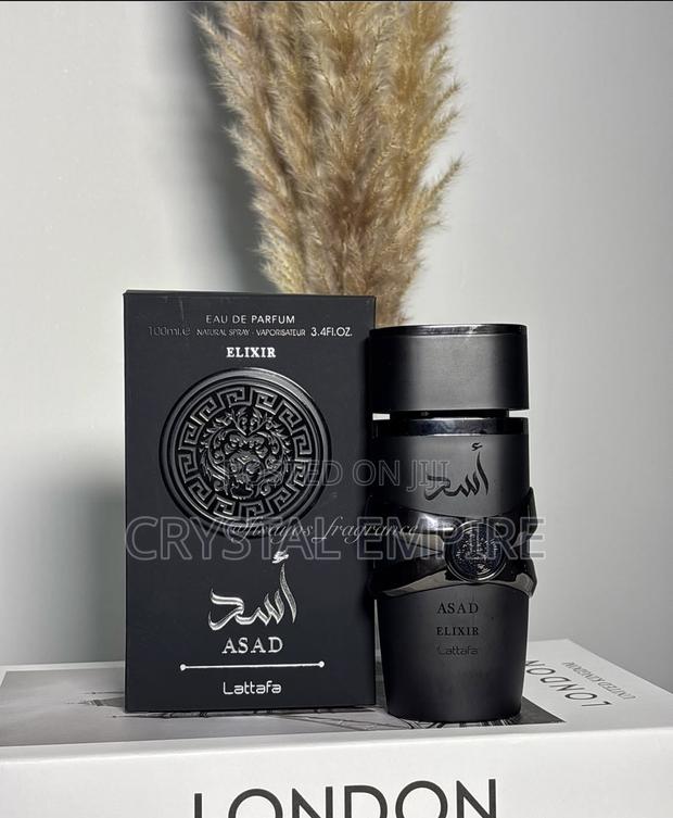 Asad Elixir Perfume by Lattafa · Photo 1