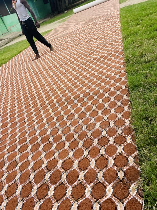 Brown Graphics Floor Carpet · Photo 1