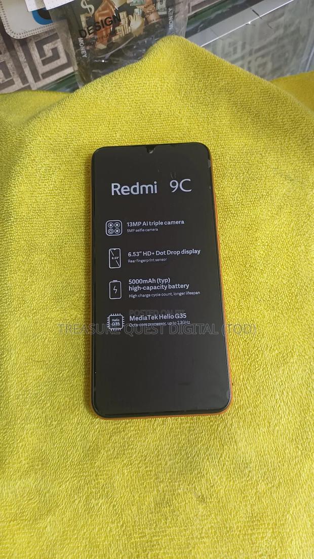 Xiaomi Redmi 9C 128 GB Red · Photo 2