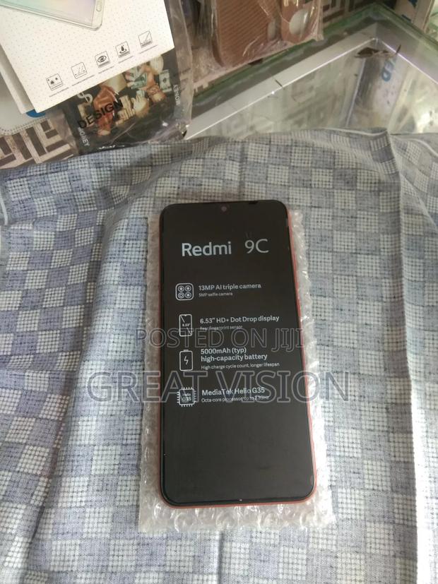 Xiaomi Redmi 9C 128 GB Red · Photo 1