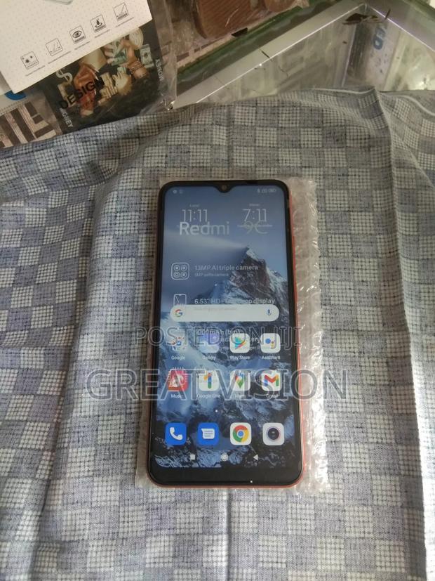 Xiaomi Redmi 9C 128 GB Red · Photo 3