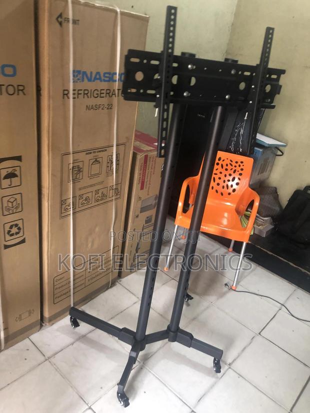 Easy to Assemble Mobile Tv Stand on Wheels for 32-75 Inch · Photo 1