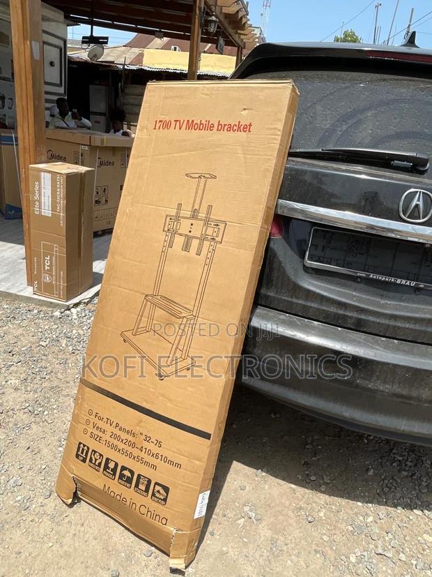 1700 Modern Rolling Tv Stand Secure Practical · Photo 1