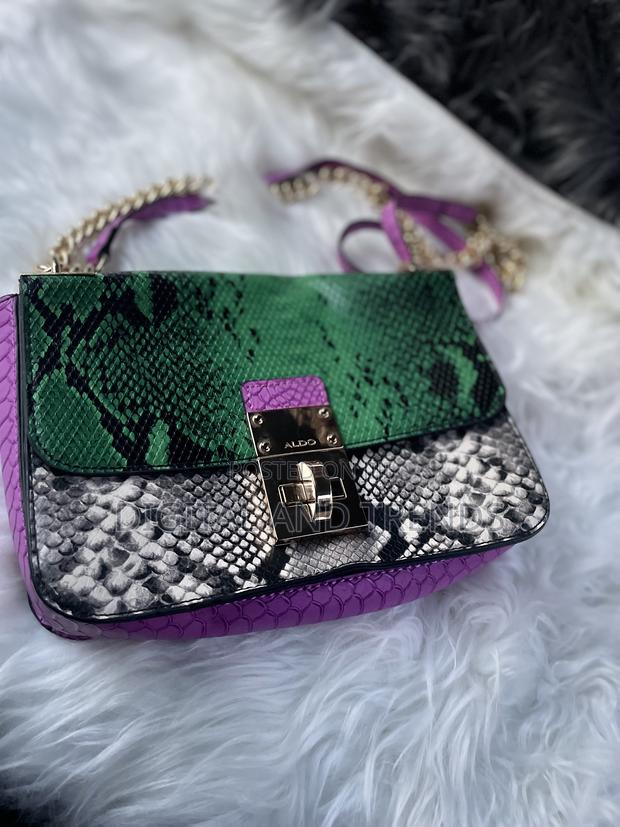 Aldo Colby Snake-Embossed Crossbody Bag. · Photo 1