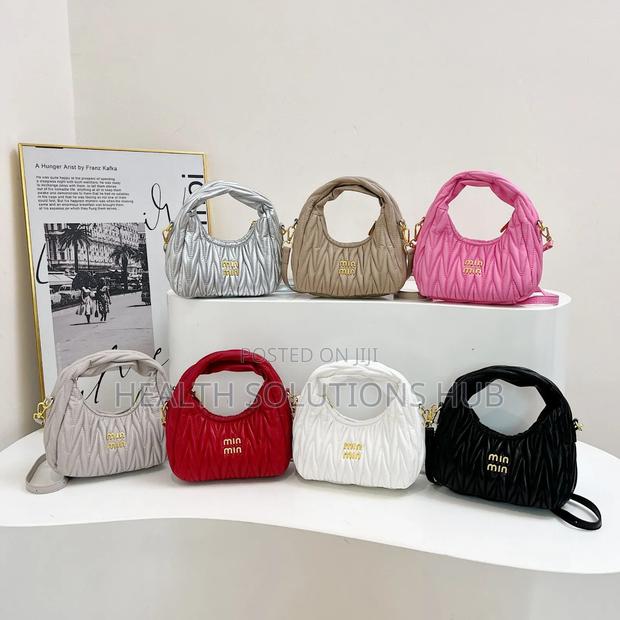 Designer Bag · Photo 1