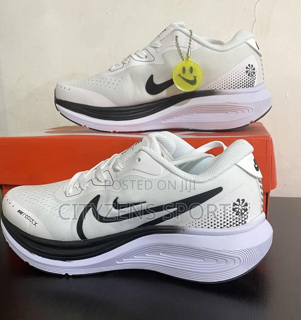 Nike White Trainers · Photo 1