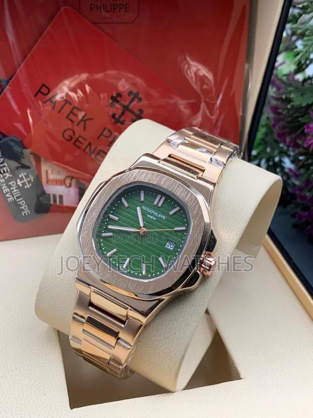 Rose Gold Patek Philippe Stainless Watch · Photo 3