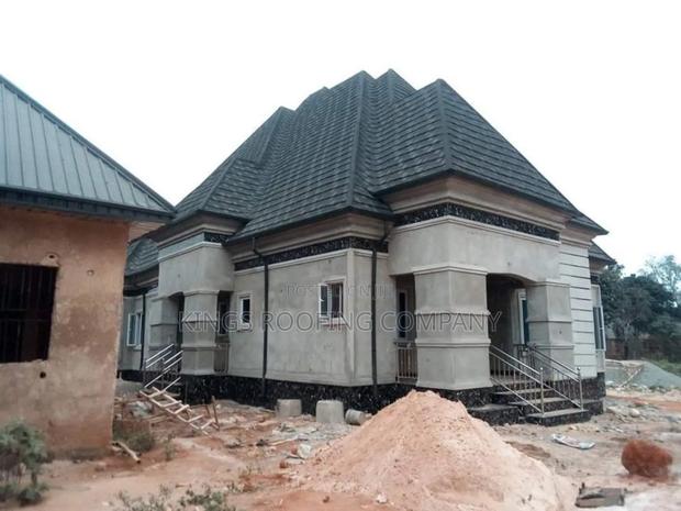 Big House Roofed With Shingle Euro Roofing Tiles · Photo 1