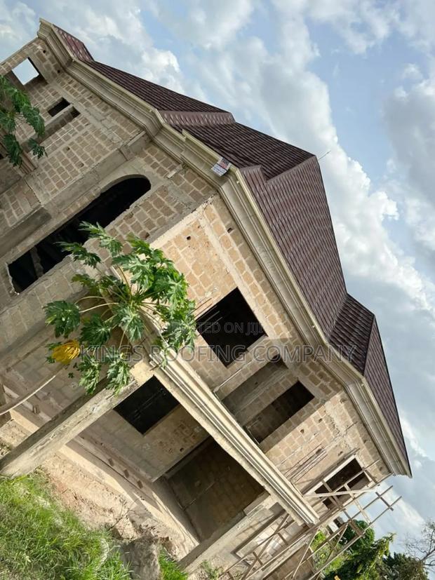 Fully Roofed House With Shingle Euro Roofing Tiles · Photo 1