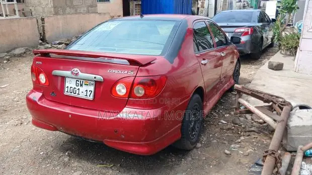 Toyota Corolla 2006 Red · Photo 1