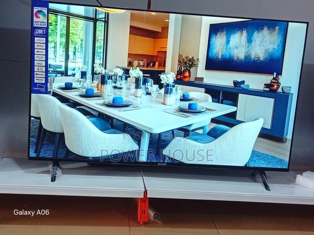 Big Screen Smart Entertainment Ailyons 55′′ · Photo 1