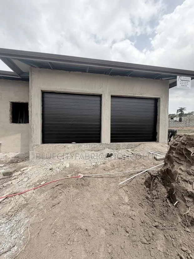 Foreign Automatic Garage With Smart Opener · Photo 1