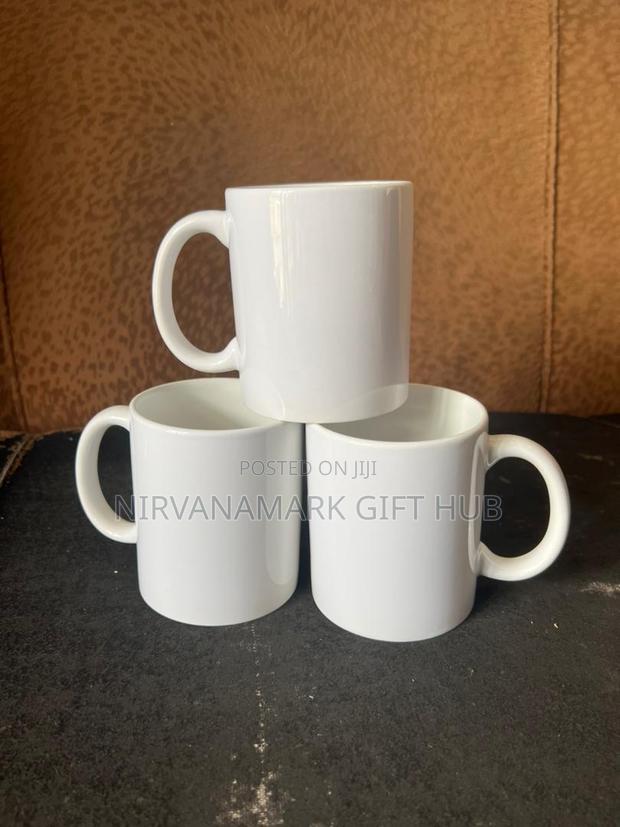 White and Magic Ceramic Mugs · Photo 5