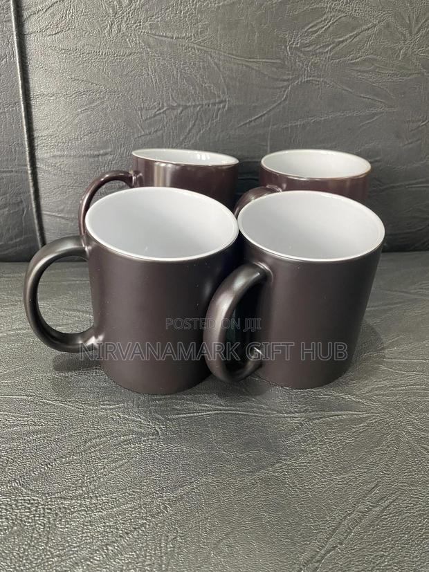 White and Magic Ceramic Mugs · Photo 4