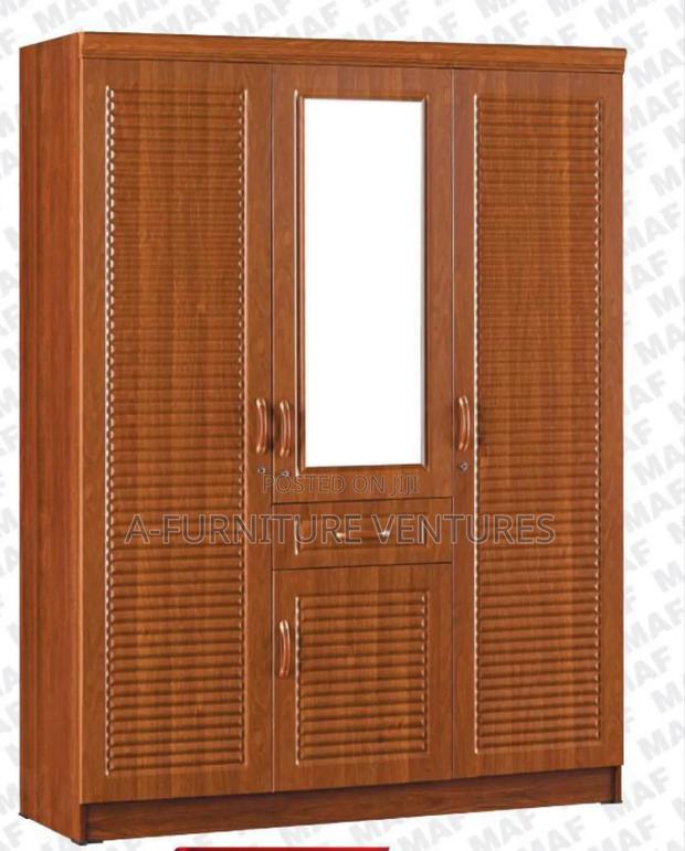 Brown Wardrobe Three Door · Photo 1