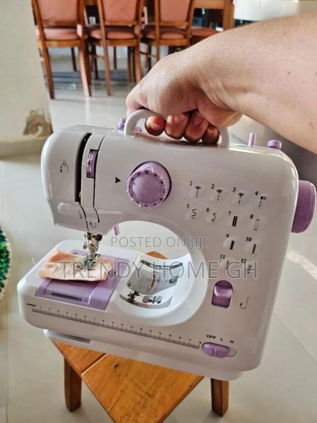 12‐Stitch Mini Portable Sewing Machine · Photo 2