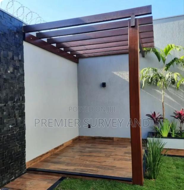 Outdoor Wooden Pergola Installation · Photo 1