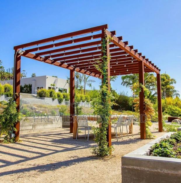 Outdoor Wooden Pergola Installation · Photo 2