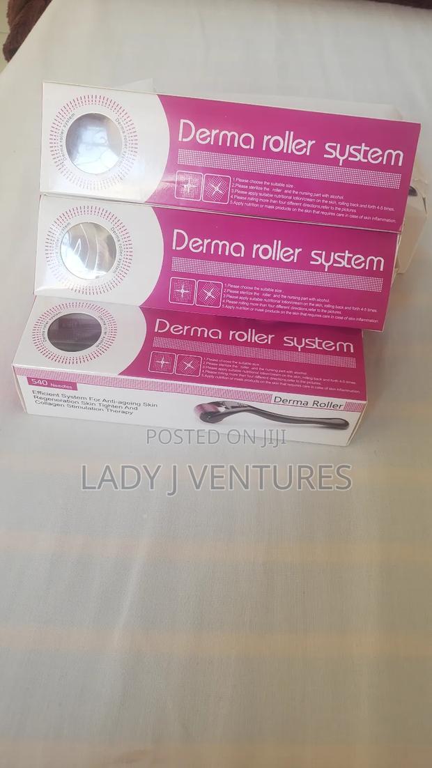 Kirkland Minoxidil Oil and Derma Roller · Photo 2