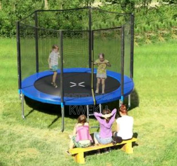 Trampoline With Safety Net · Photo 1