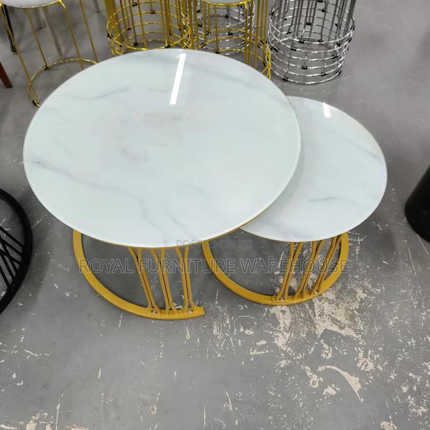 Round Nesting Coffee Tables With White Glass Top and Gold Metal Frame · Photo 2