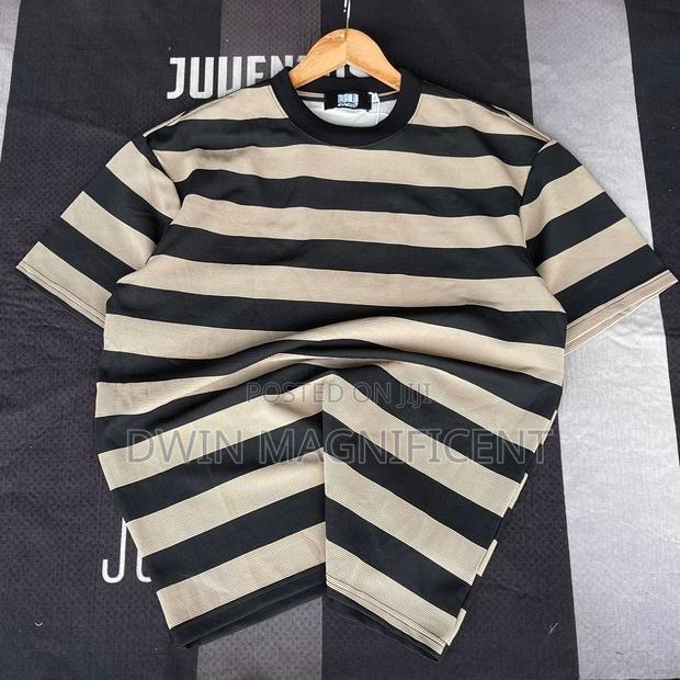Calvin Klein Striped Short-Sleeved T-Shirt. · Photo 1