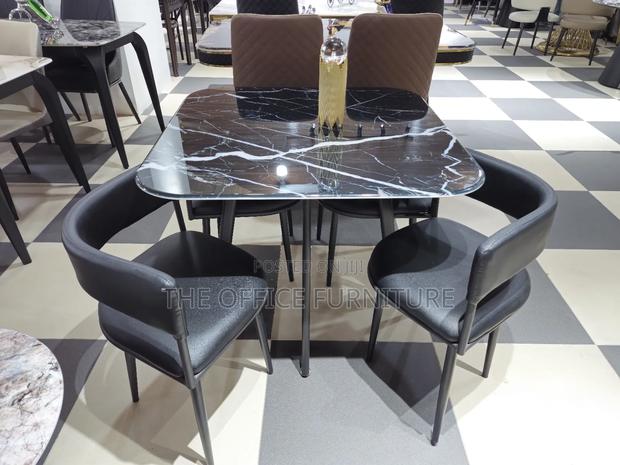 Marble Table and Four Set Dining Chairs · Photo 2