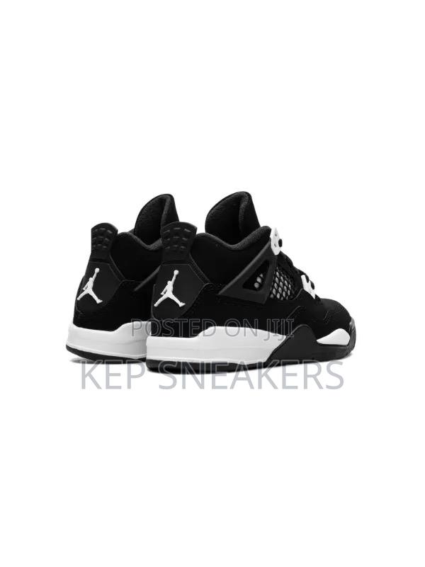 Nike Air Jordan 4 Retro "White Thunder" · Photo 1