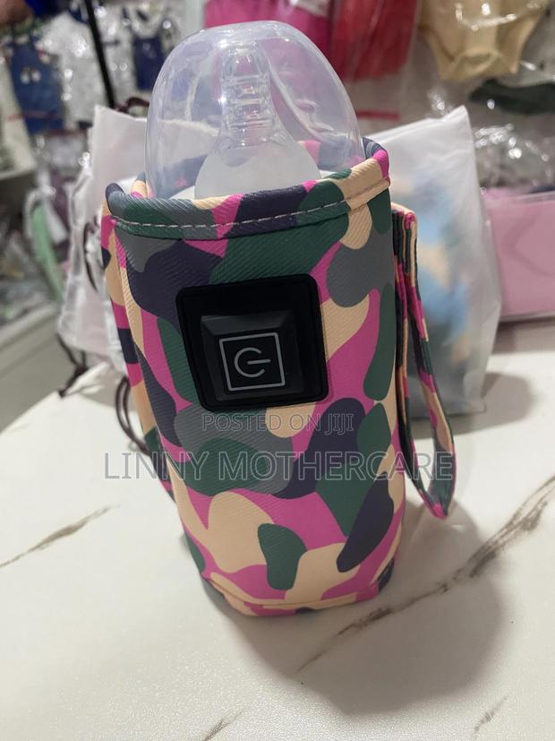 Portable Baby Bottle Warmer · Photo 1