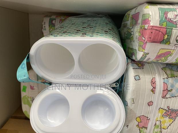 Baby Bottle Foam Warmer · Photo 1