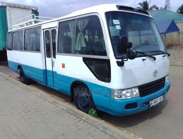 Toyota Coaster for Rent. · Photo 1