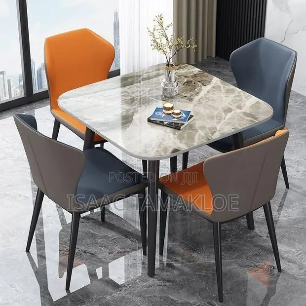 Luxurious Dinner Set 4 Chairs and a Table · Photo 2