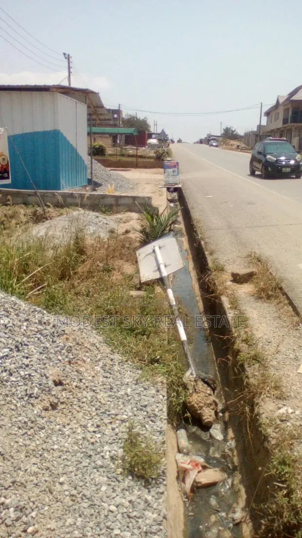 4 Plots of Land for Sell at Main Road Amasaman 3 Junction Cocobord · Photo 1
