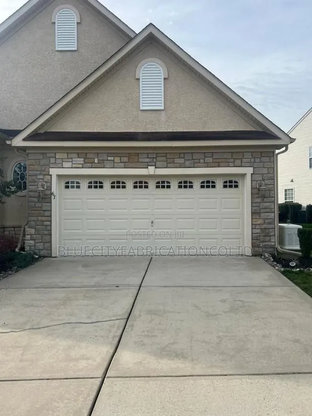 18ft X 8 Automatic Garage Door With Small Windows/ Fanlight for Sale · Photo 1