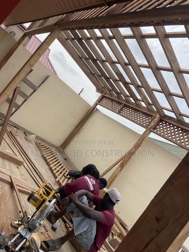 Hardwood Pergola Under Installation · Photo 1
