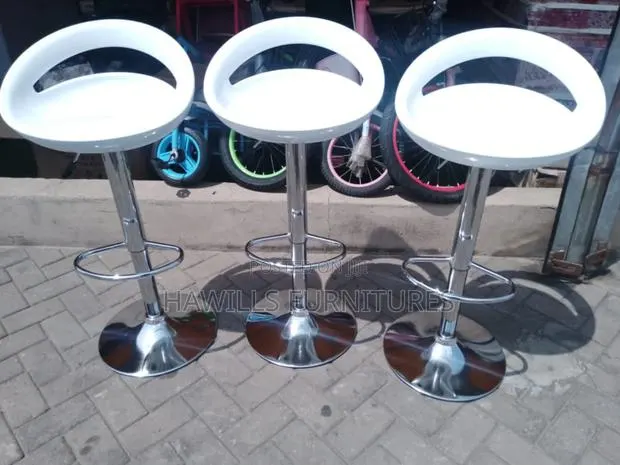 Adjustable White Bar Stool · Photo 1