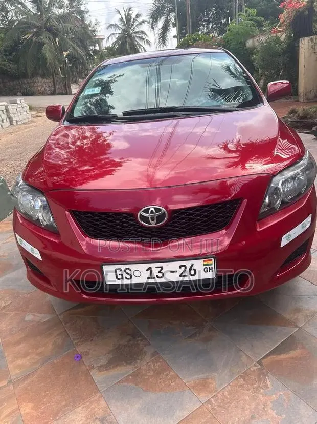 Toyota Corolla 2010 Red · Photo 1