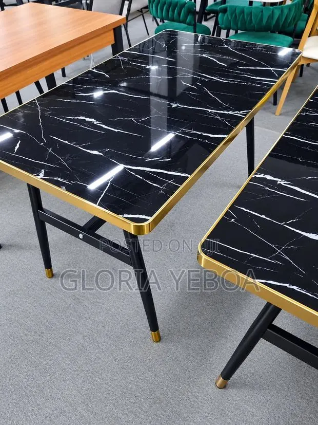 Modern Black Marble-Effect Dining Table With Gold Trim. · Photo 1