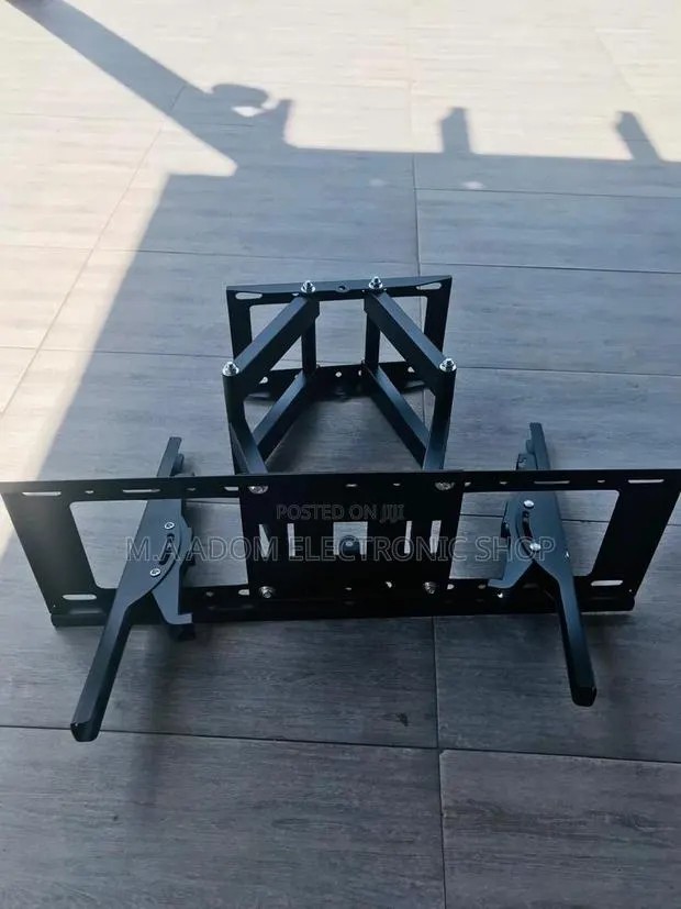The Perfect TV Mount for Your Home:Adjustable 33”-60 Mount · Photo 1