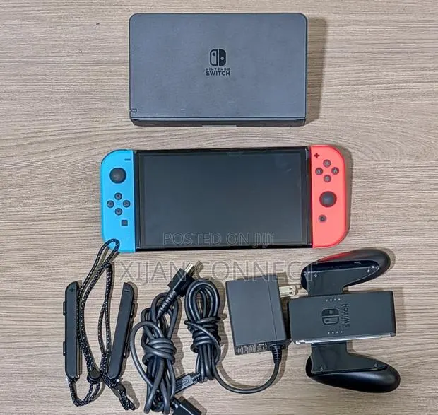 NINTENDO SWITCH OLED Complete Set (New Condition Without Original Box) · Photo 1