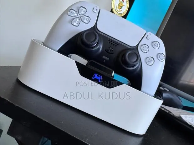PS5 Standard With 4 Games · Photo 1